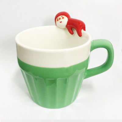 A cup full of warmth — and a cat on top!